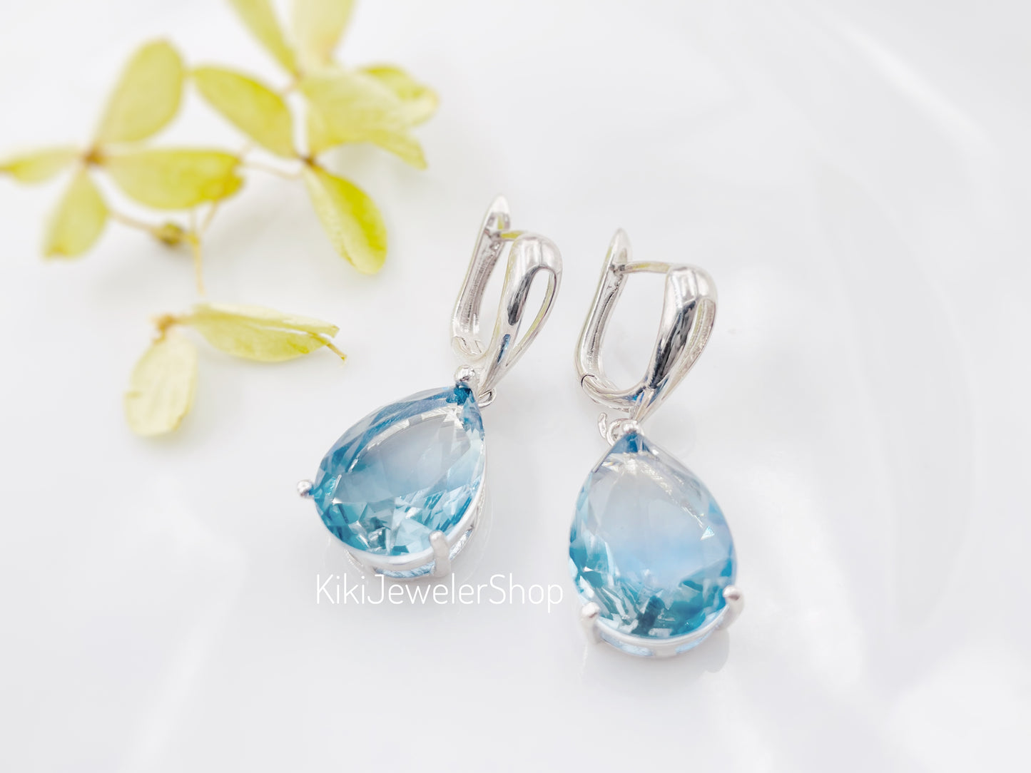 Large bicolor blue sapphire dangles gold