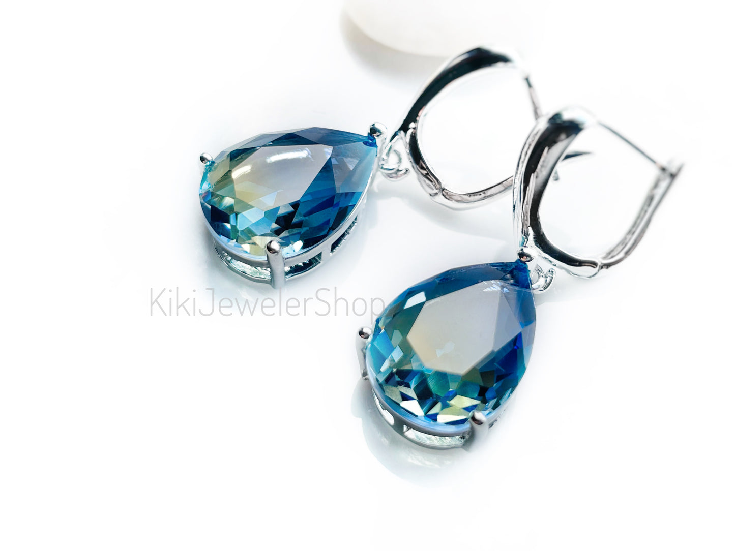 Large bicolor blue sapphire dangles gold