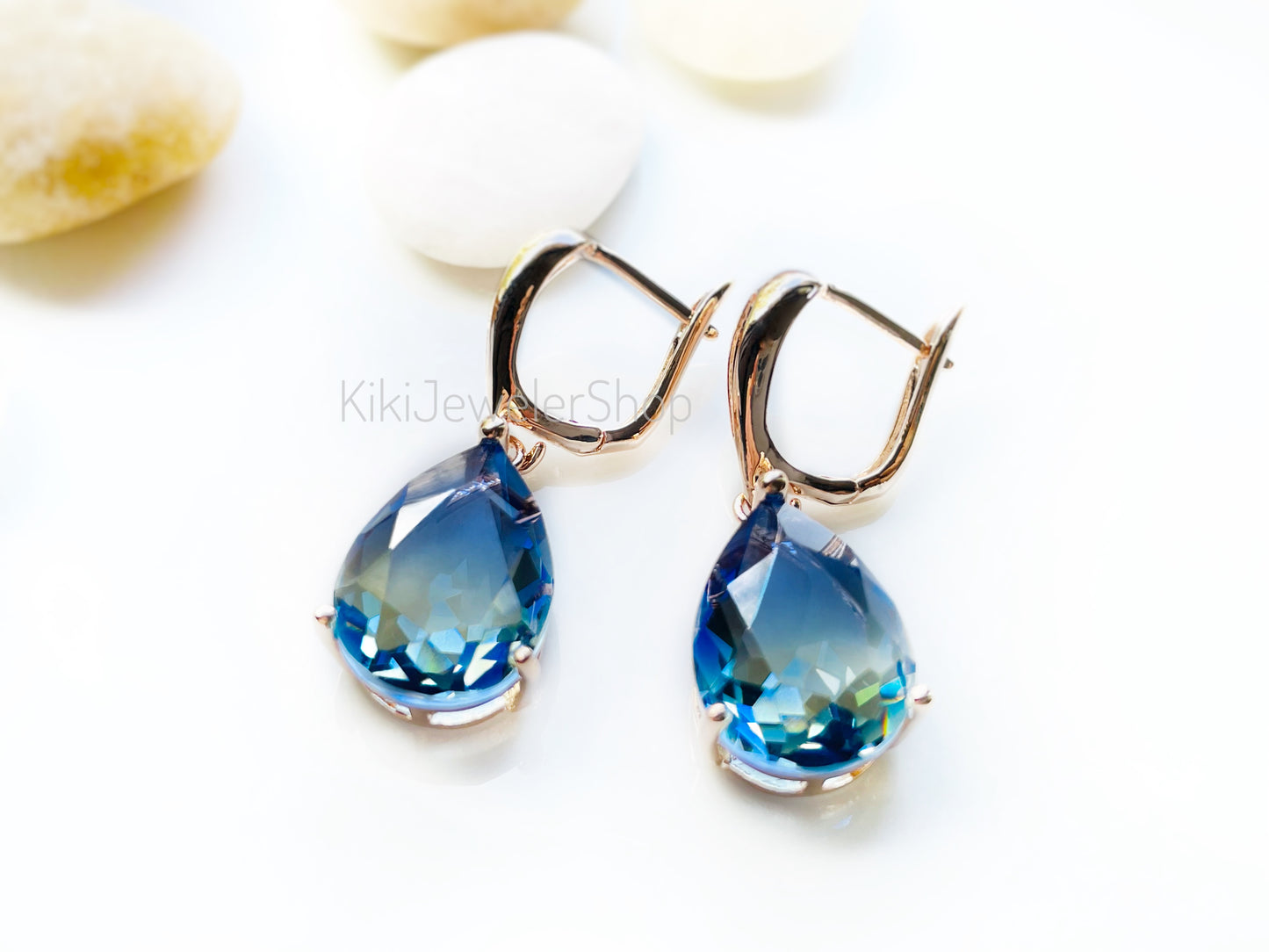Large bicolor blue sapphire dangles gold