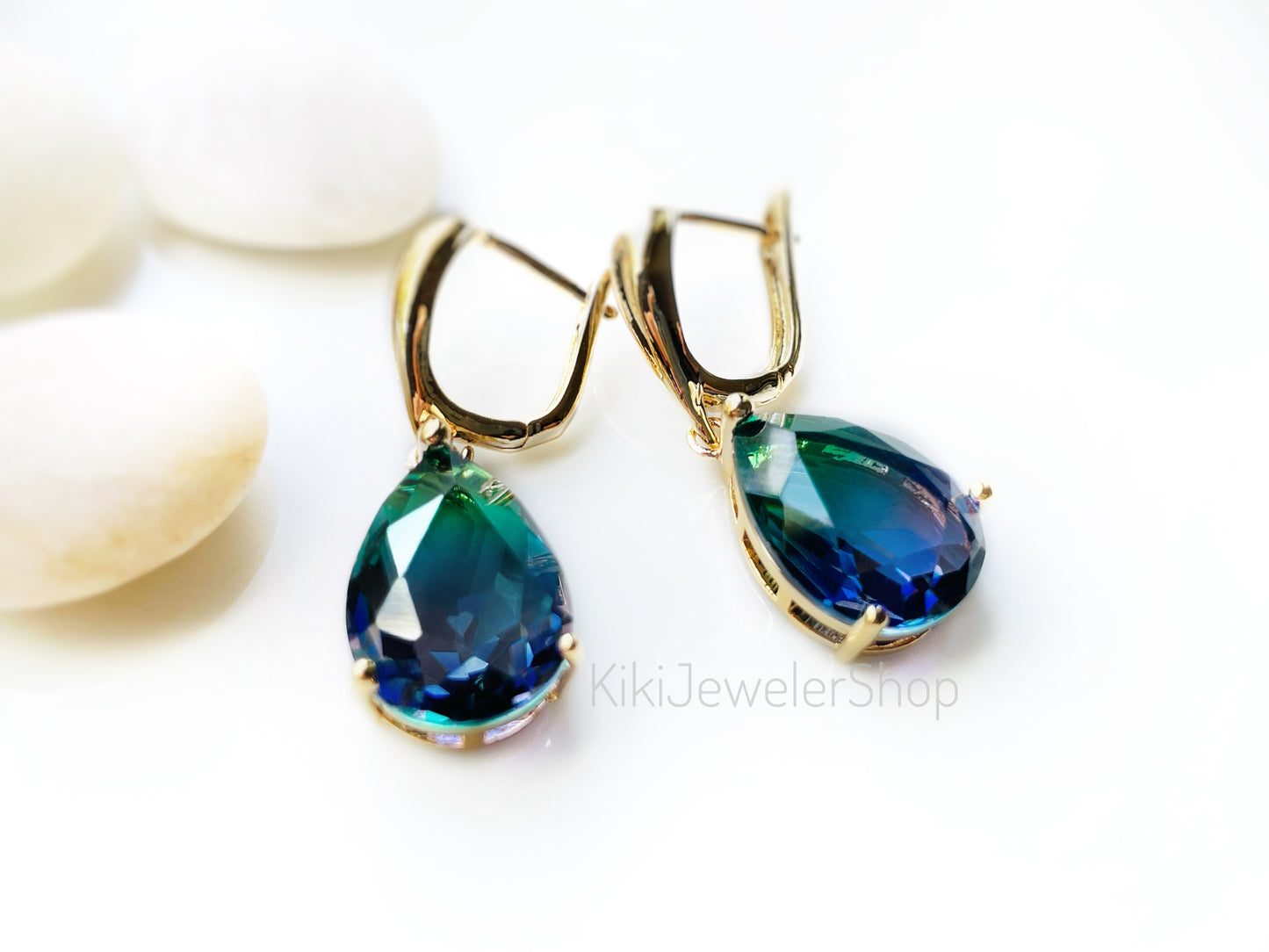 Large bicolor blue sapphire dangles gold
