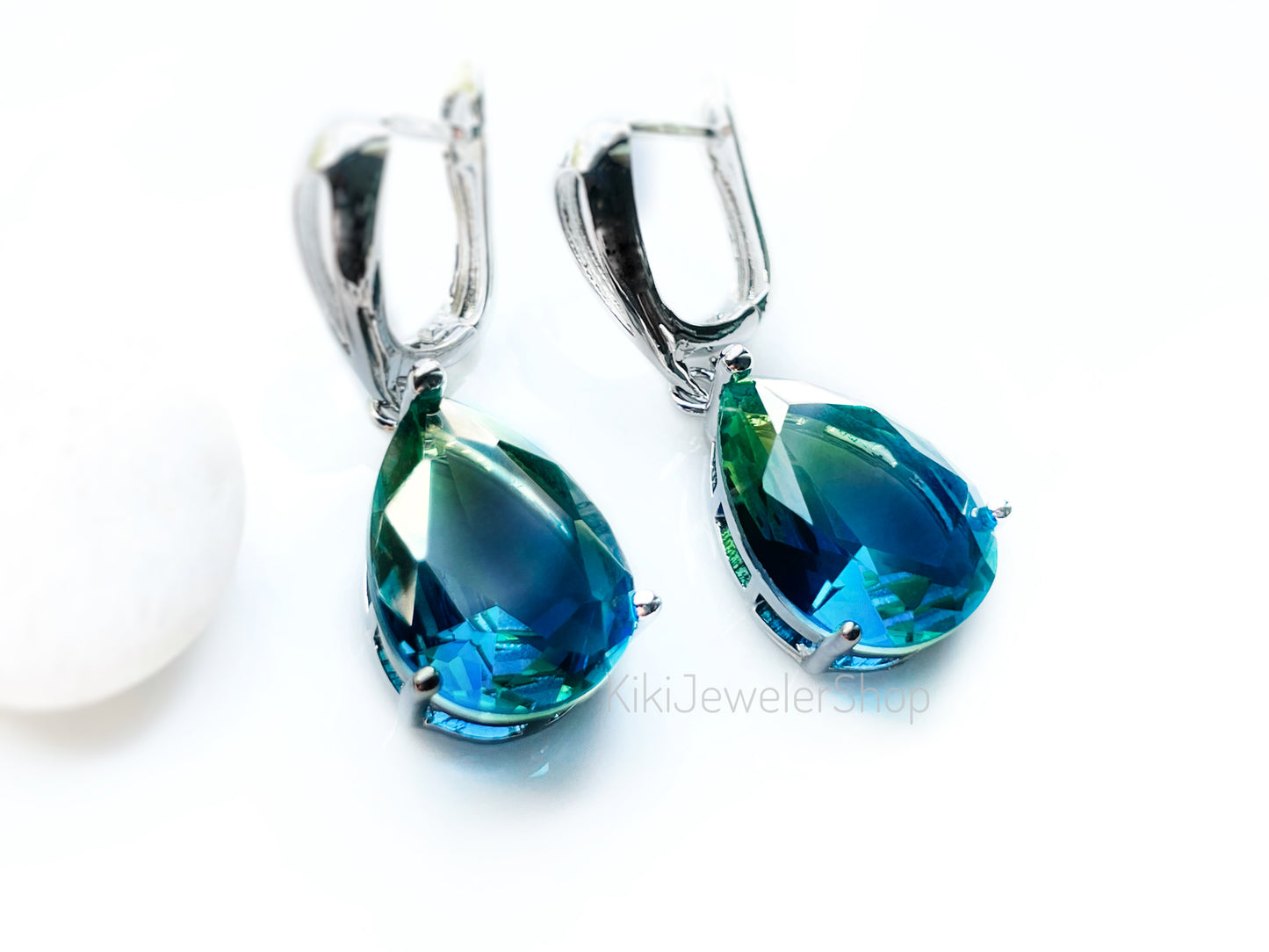 Large bicolor blue sapphire dangles gold