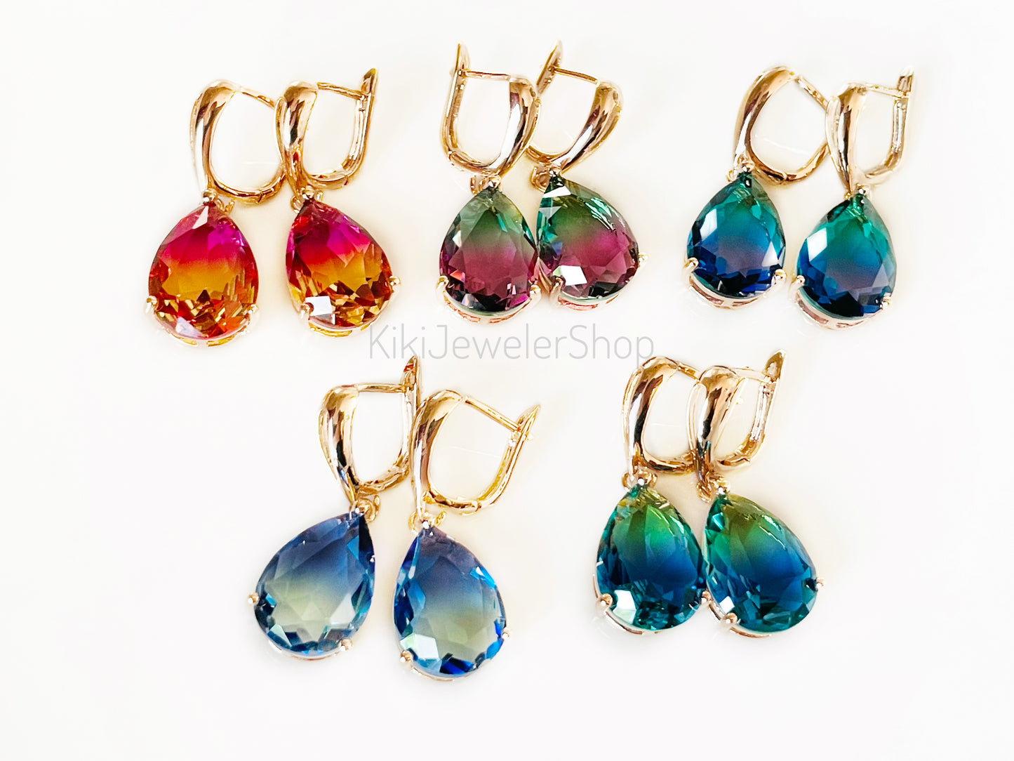 Large bicolor blue sapphire dangles gold