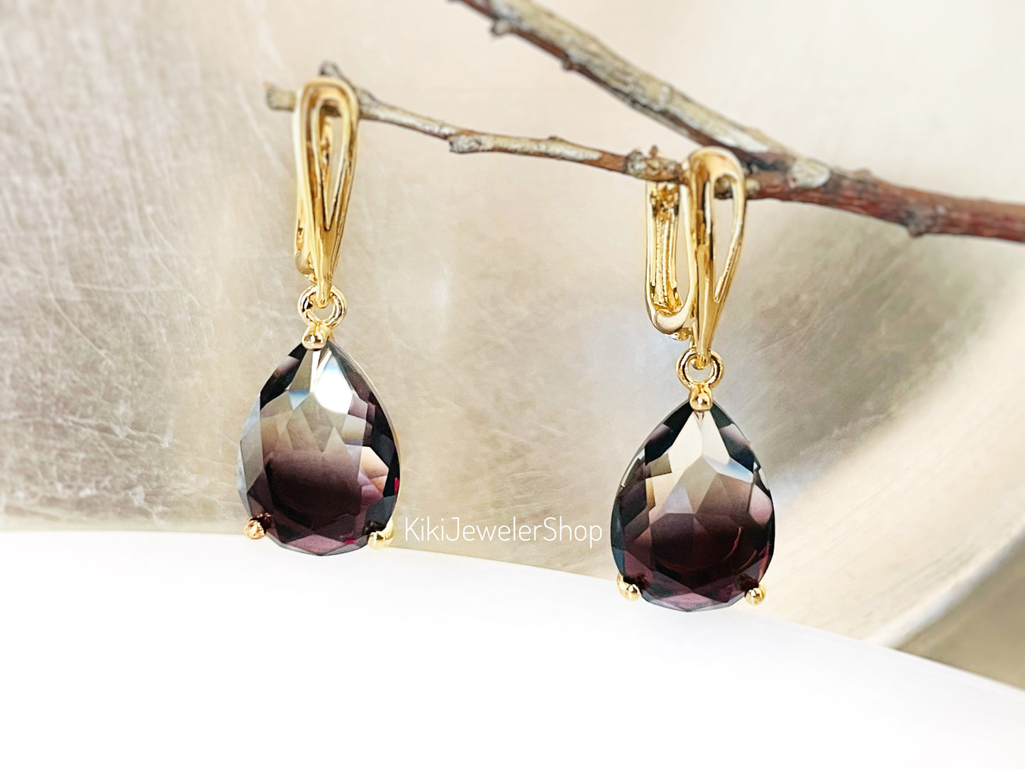 Large bicolor blue sapphire dangles gold