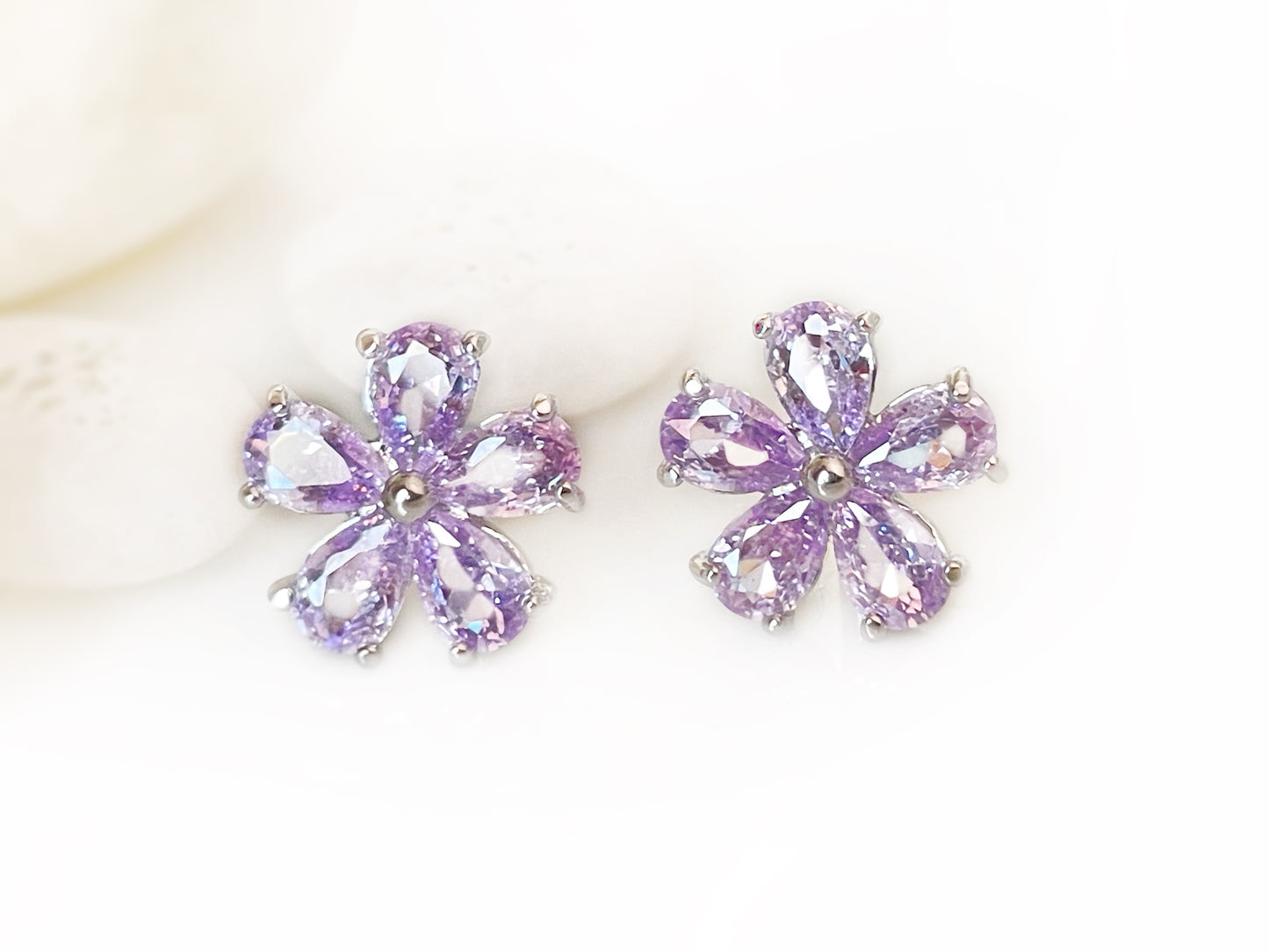 Amethyst flower stud earrings. Flower studs